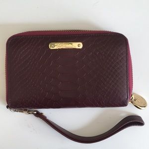 Gigi Zip Around Wristlist in Plum